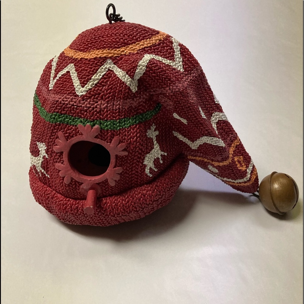 Bird house Stocking cap. It hangs from a chain.